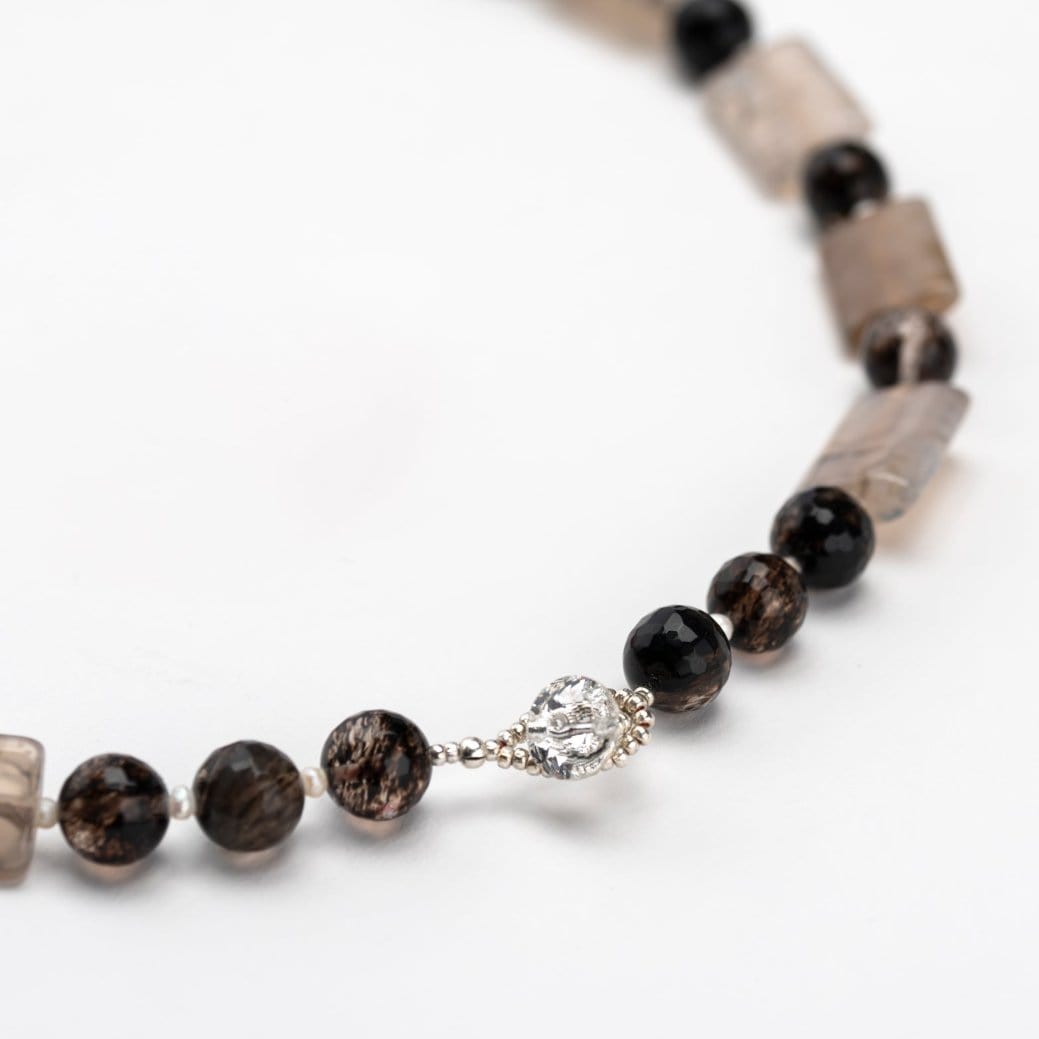 Faceted Dragon Vein Agate Quartz Necklace showing the buttoned clasp.
