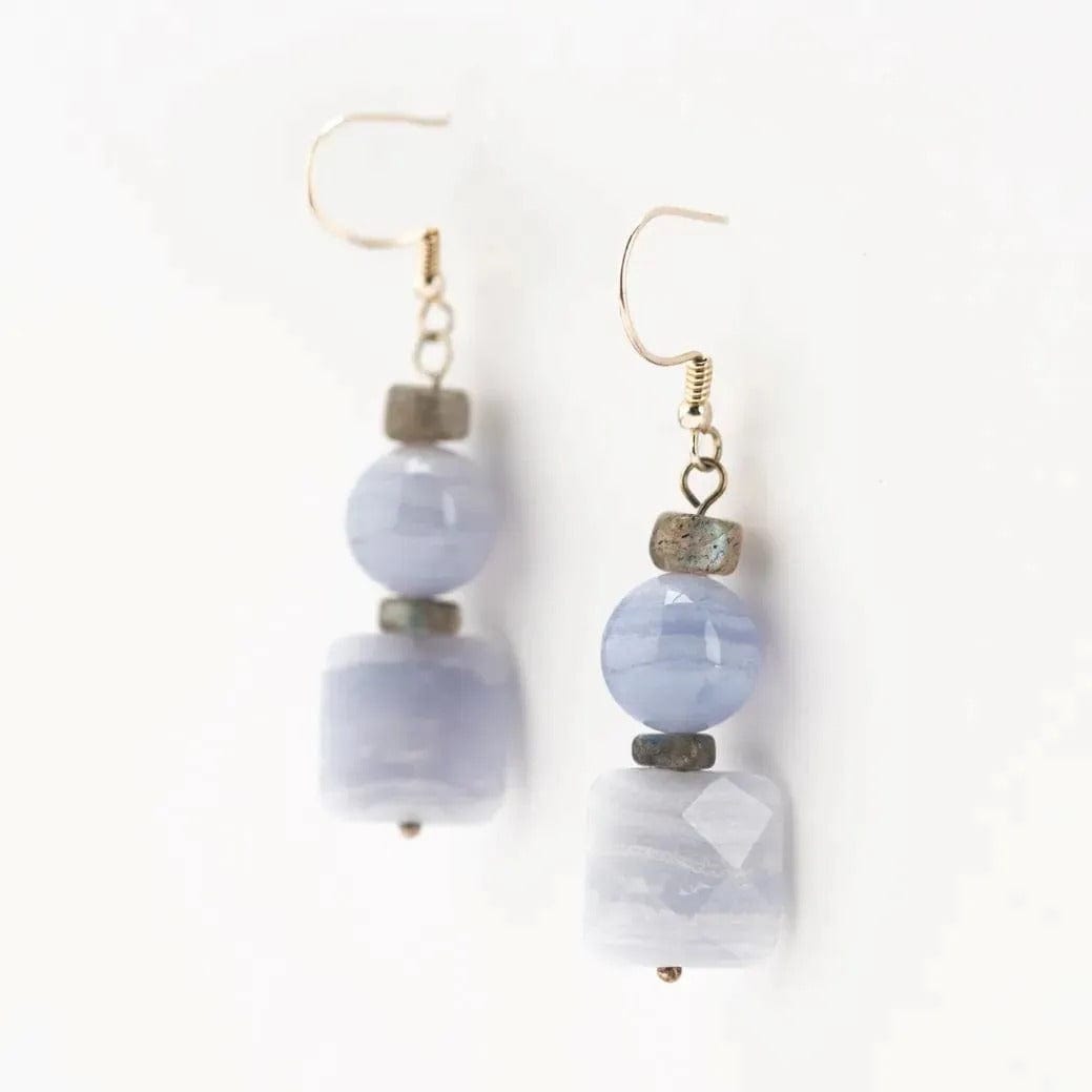 A pair of sterling silver earrings featuring round and faceted square blue lace agate beads, with labradorite rondelles.