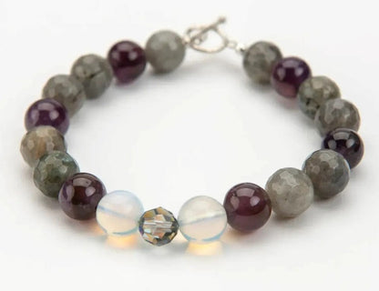 Beaded bracelet with multicolored beads on a white background