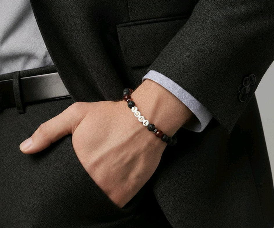 Man with his hand in his pocket and wearing the Men's Soul Bracelet. 