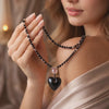 Woman with a necklace over her shoulder